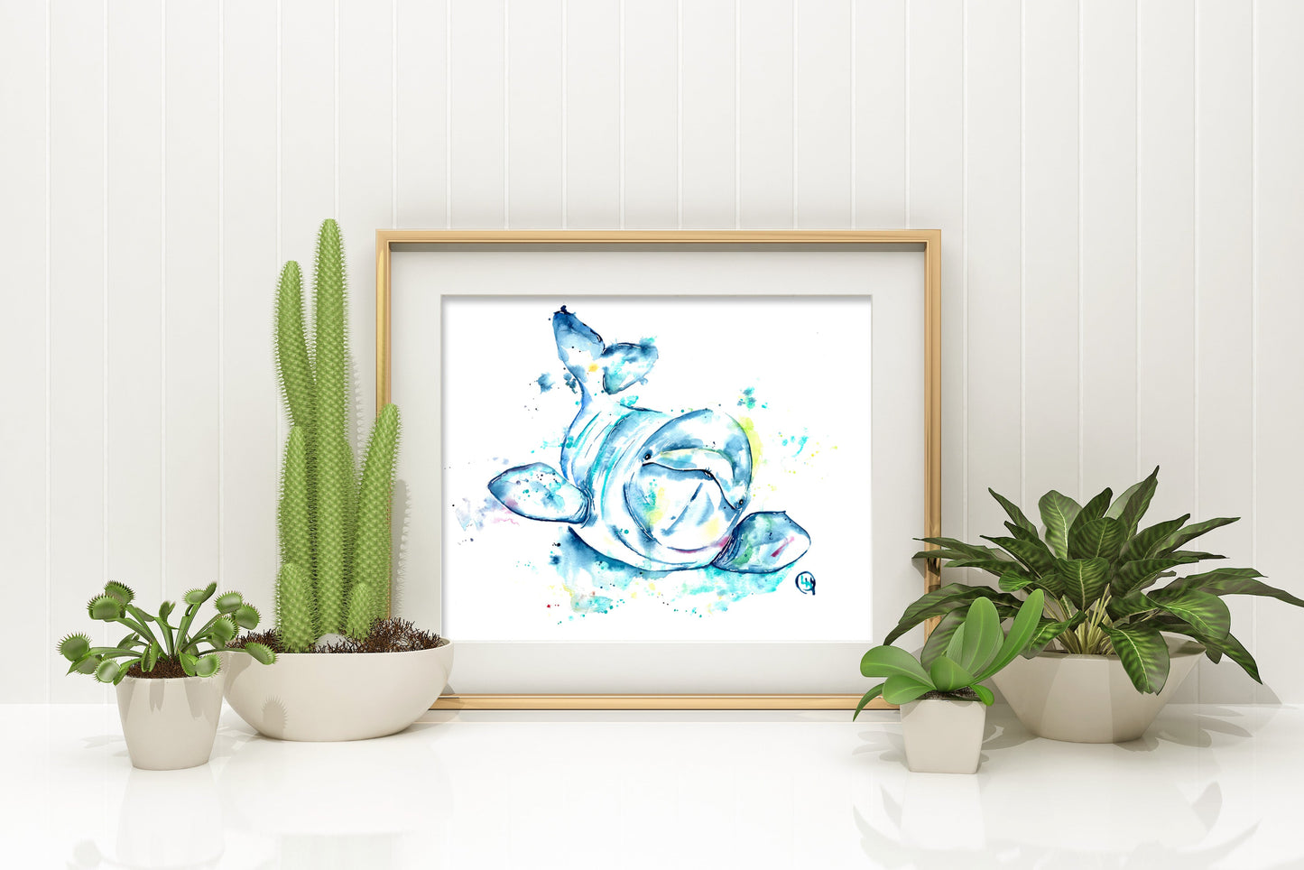 Baby Beluga Art Print in a gold frame